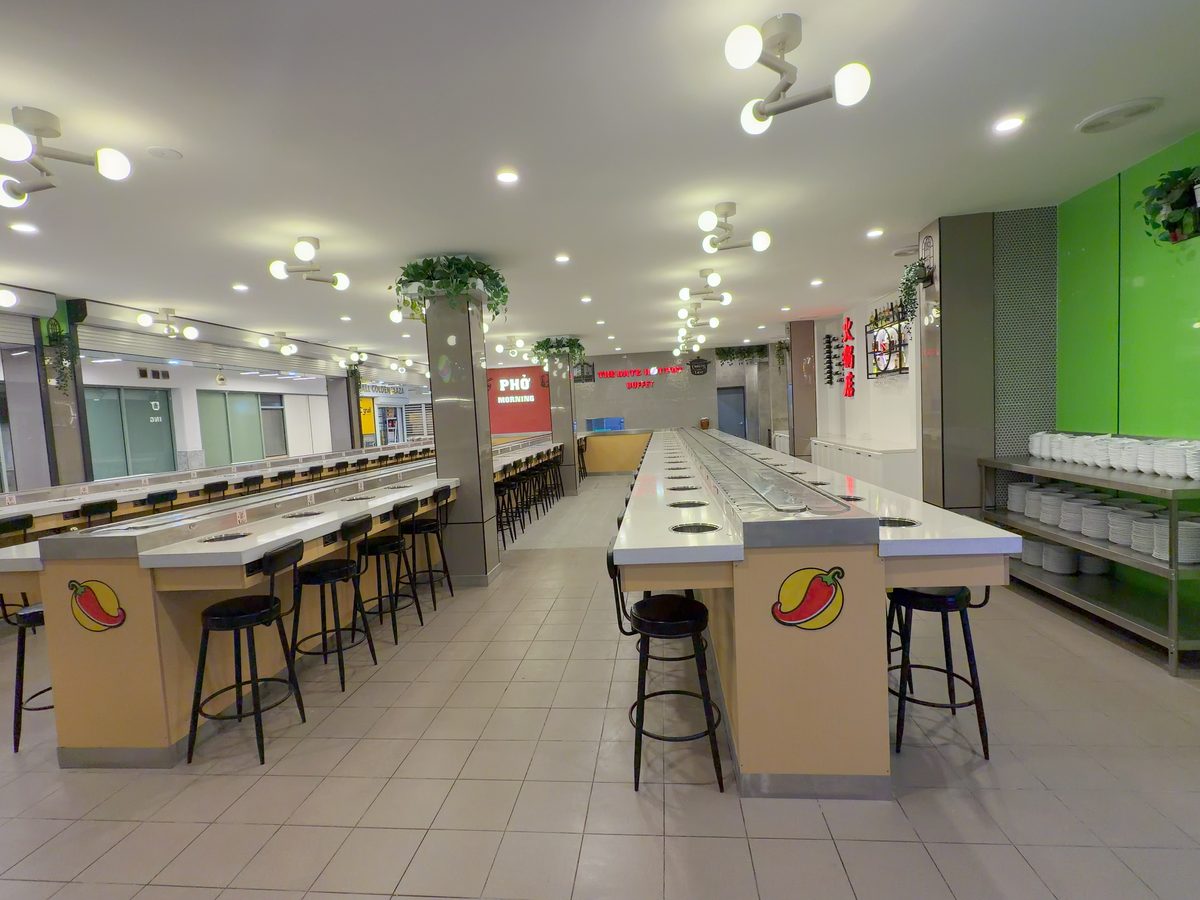 The Gate Hot Pot dining floor and conveyor belt bar